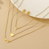 A golden stainless steel heart-shaped necklace with the letter "you" stacked on top, paired with the same style of stud earrings, exudes a gentle, romantic, high-end and niche design full image